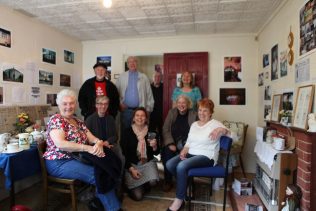 Elisabeth and Jane with prefab residents and enthusiasts. The Prefab Museum | Prefab Museum