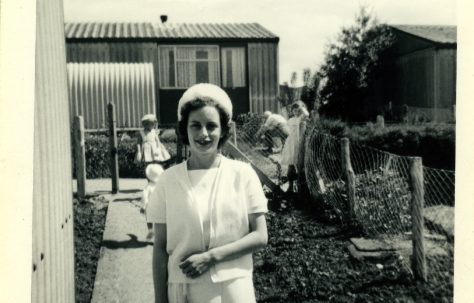 Diane, Alan Page's wife, in front of their Arcon MkV prefab