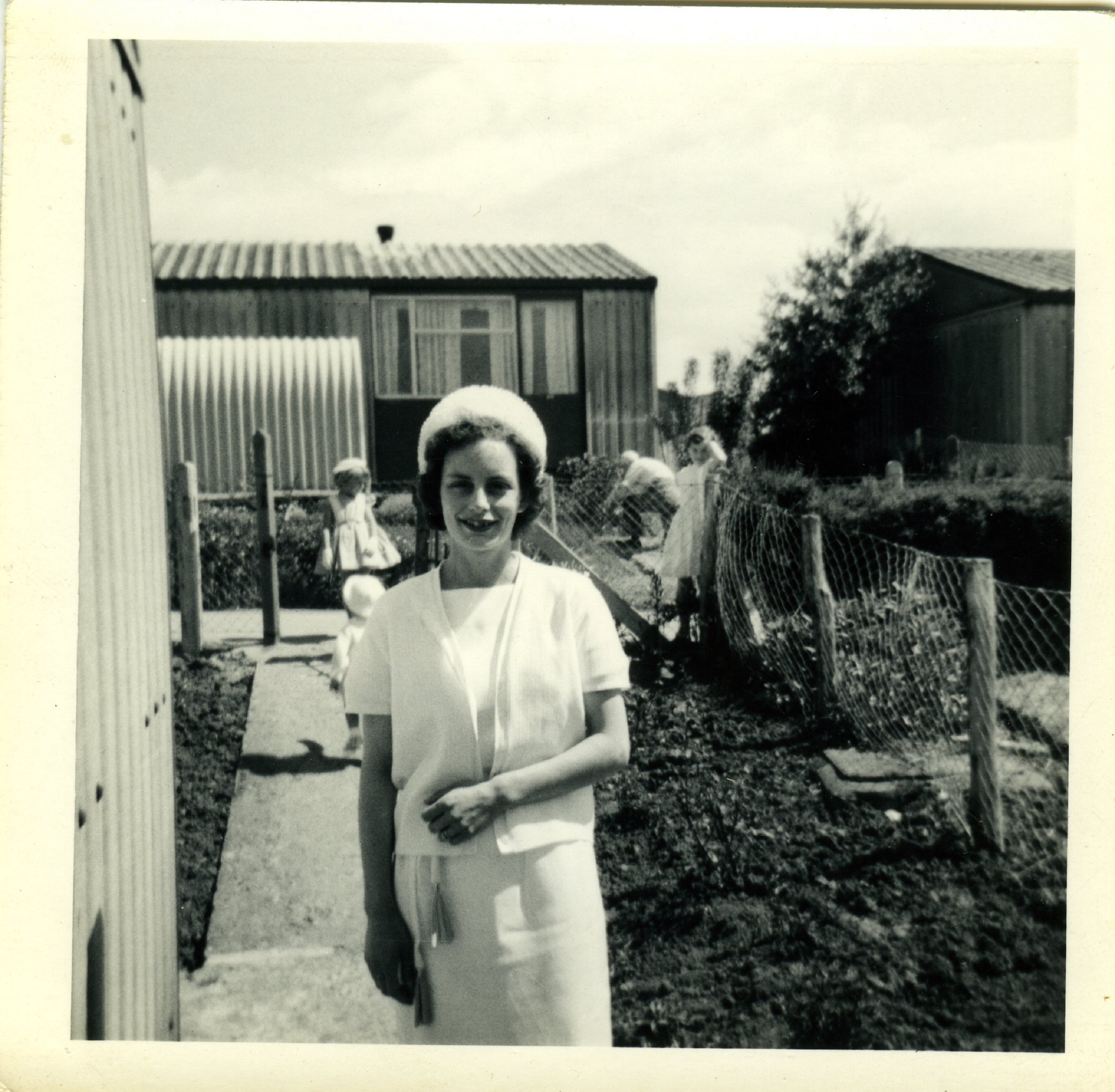 Diane, Alan Page's wife, in front of their Arcon MkV prefab