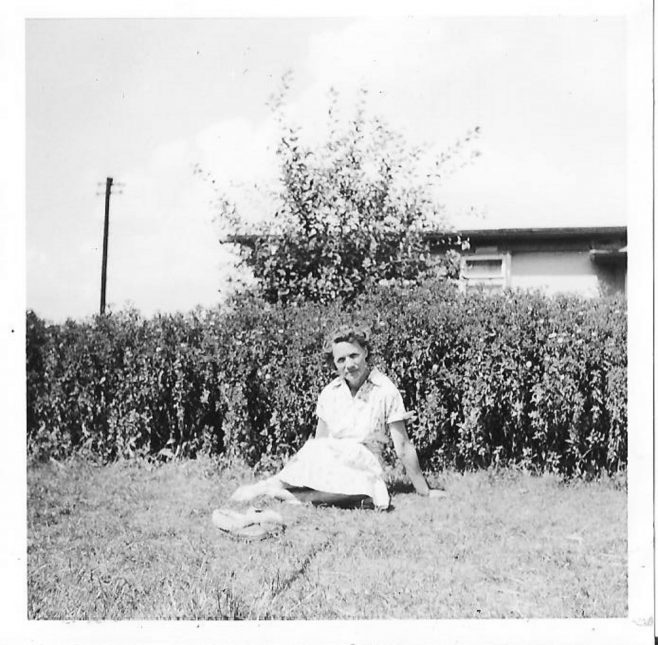 Mrs Clare sitting in the garden of her prefab | Hearn,Jane