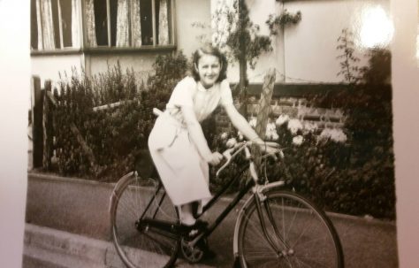 Eileen's sister Pat on her new bike in front of the prefab, Lower Jackwood Close, Eltham