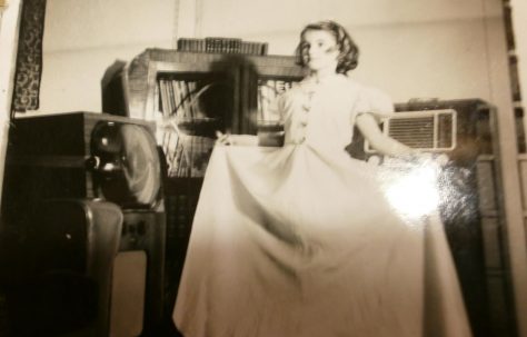 Prefab interior with Eileen in bridesmaid's dress, Lower Jackwood Close