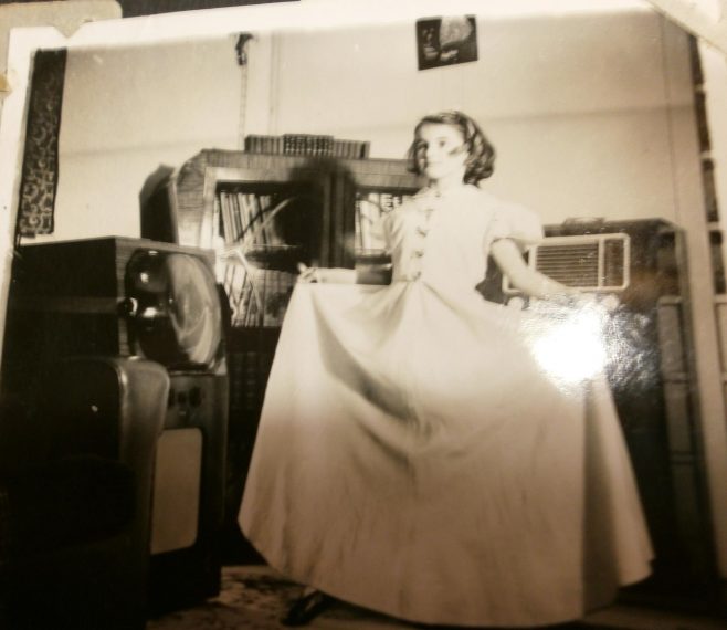 Prefab interior with young girl in long dress, Lower Jackwood Close | Hearn,Jane