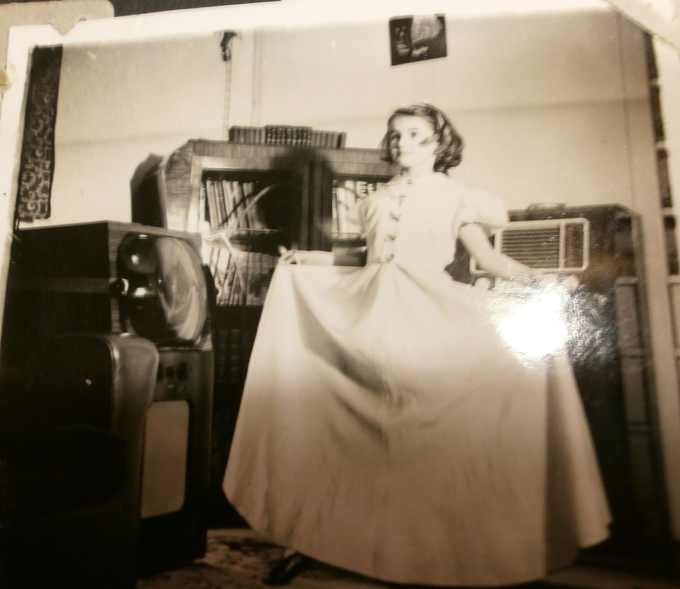 Prefab interior with Eileen in bridesmaid's dress, Lower Jackwood Close