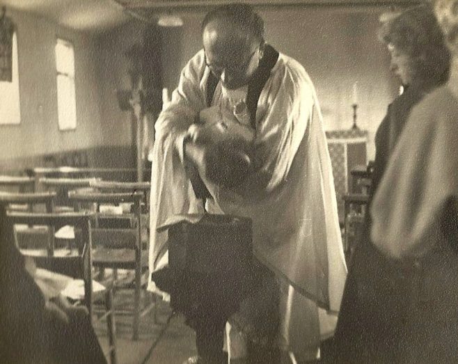 A Brine family baby being baptised at St Mark's Church, nicknamed 
