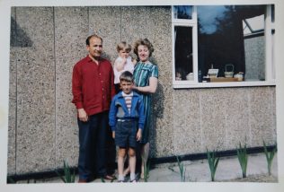 Mrs and Mrs Kapitan with their two children in front of their Ipswich prefab | June Kapitan