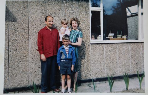 Mrs and Mrs Kapitan with their two children in front of their Ipswich prefab