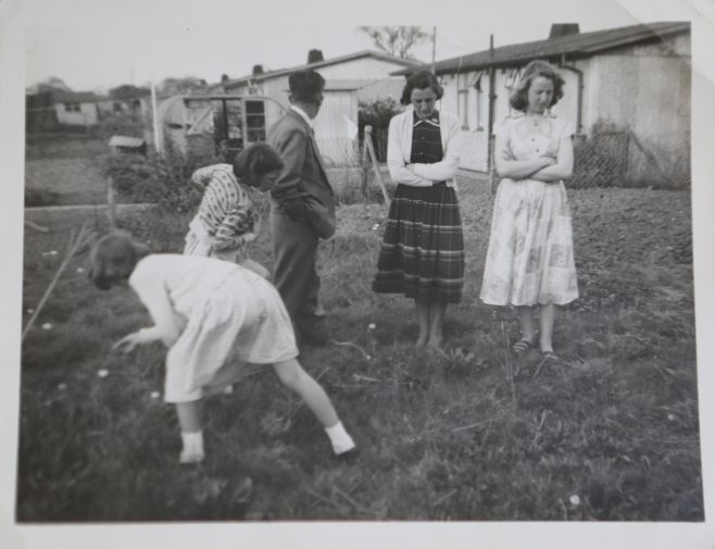 Kapitan family group in prefab garden | Hearn,Jane