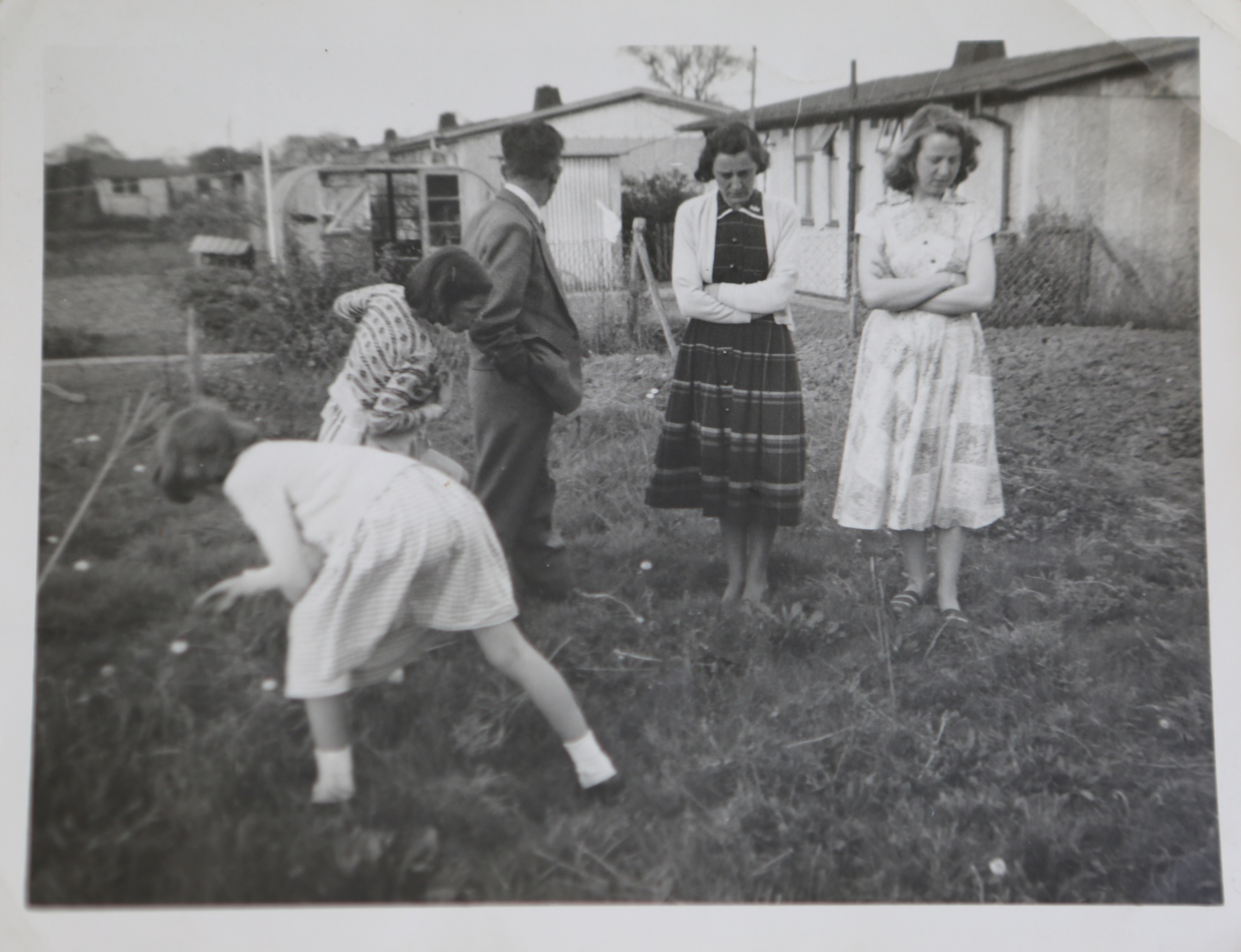 Kapitan family group in prefab garden