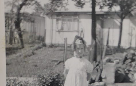 Penny Bishop in her prefab garden