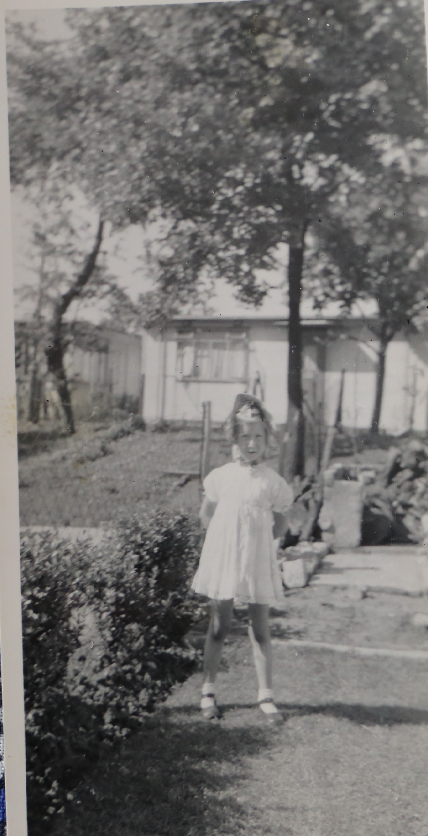 Penny Bishop in her prefab garden