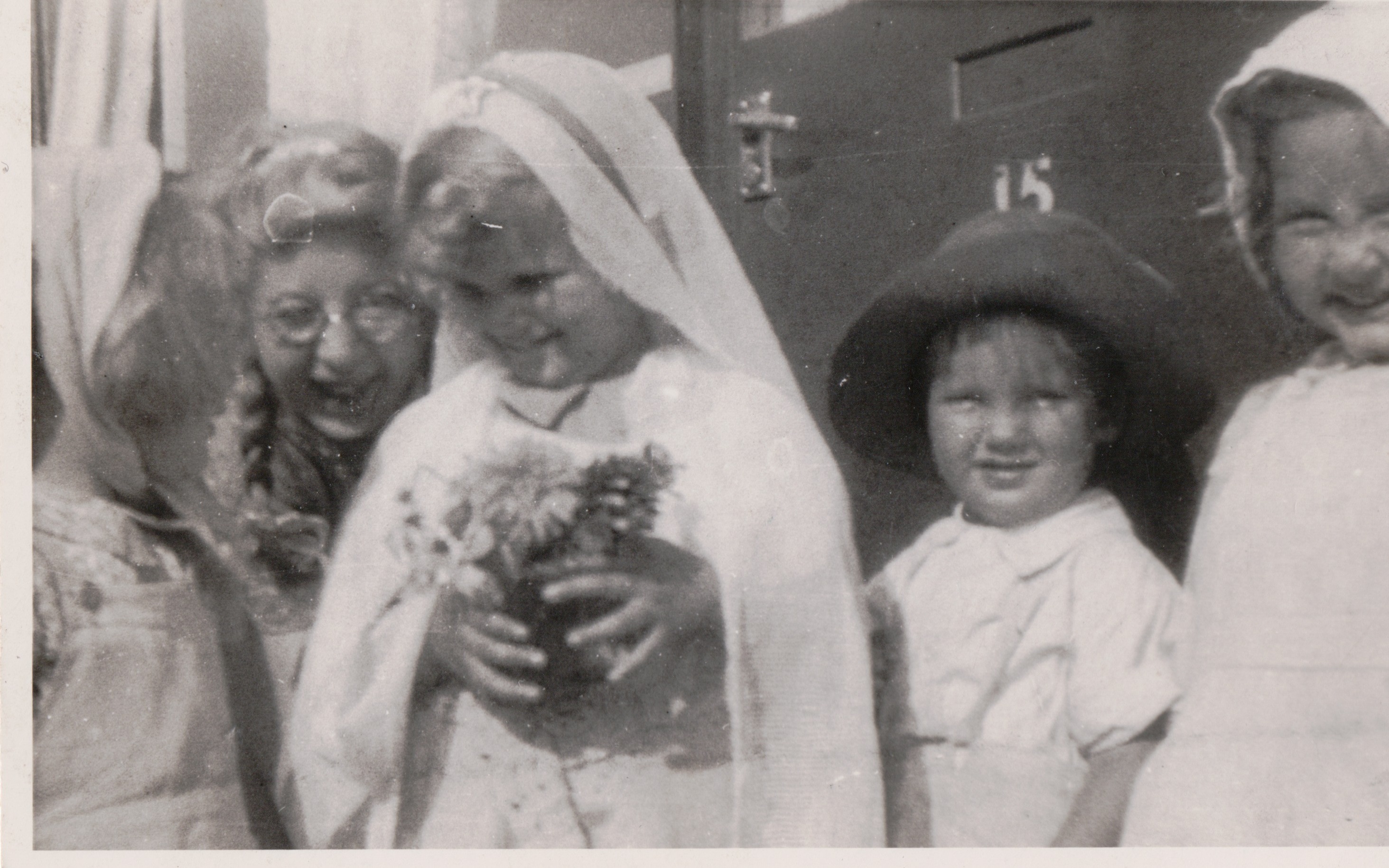 Kathryn, her brother Neal and three children in fancy dress outside the prefab, St Pauls Cray