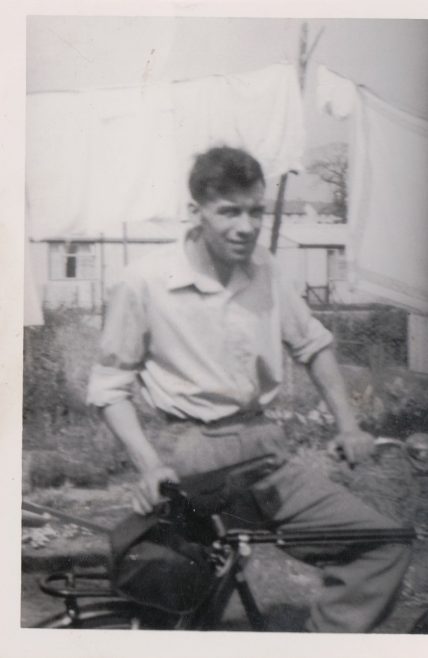 Kathryn's dad with bike in front of Arcon MkV prefab | Hearn, Jane