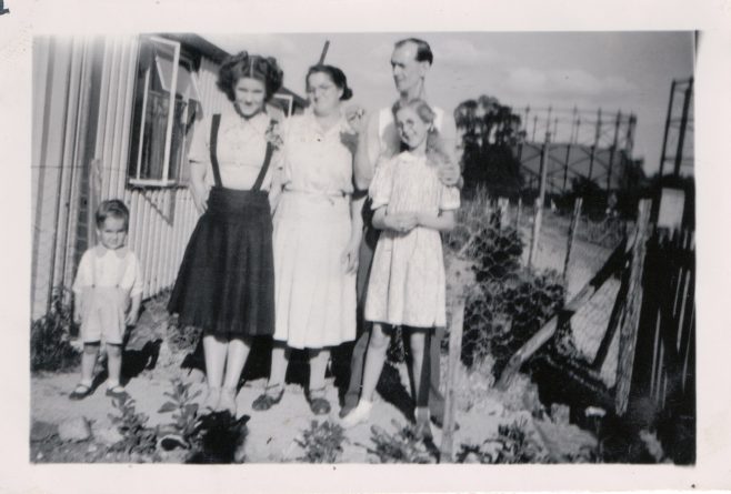 Family group outside the prefabs | Hearn, Jane