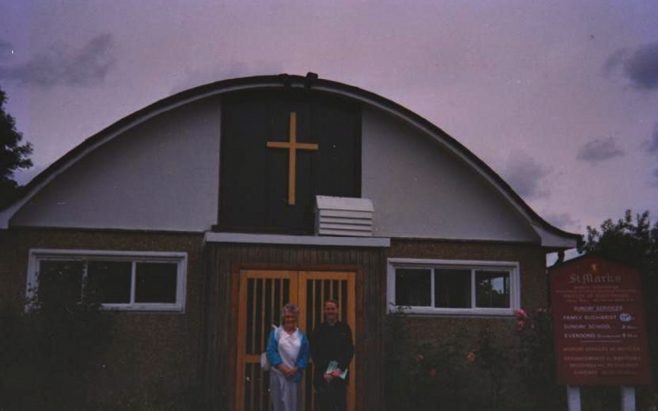 Photograph of a man and a woman, probably Alan's mum, from the Brine family in front of St Mark's Church, the 