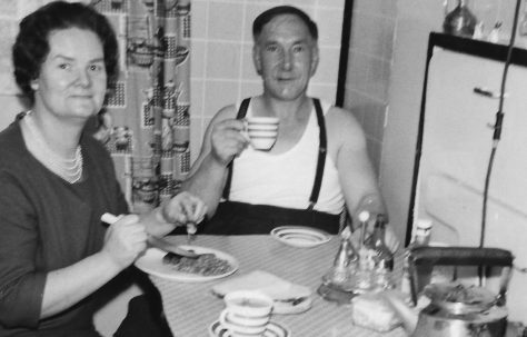 Mum and Dad in the prefab kitchen.  Stewart Street, London E14