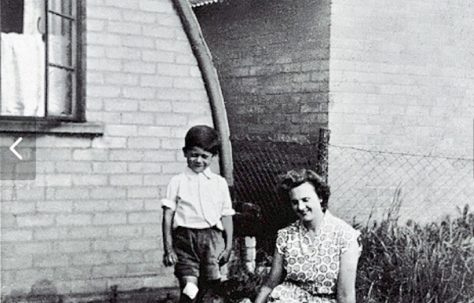 Peter and his mother in front of their Nissen Hut in Bentham Road, London E9