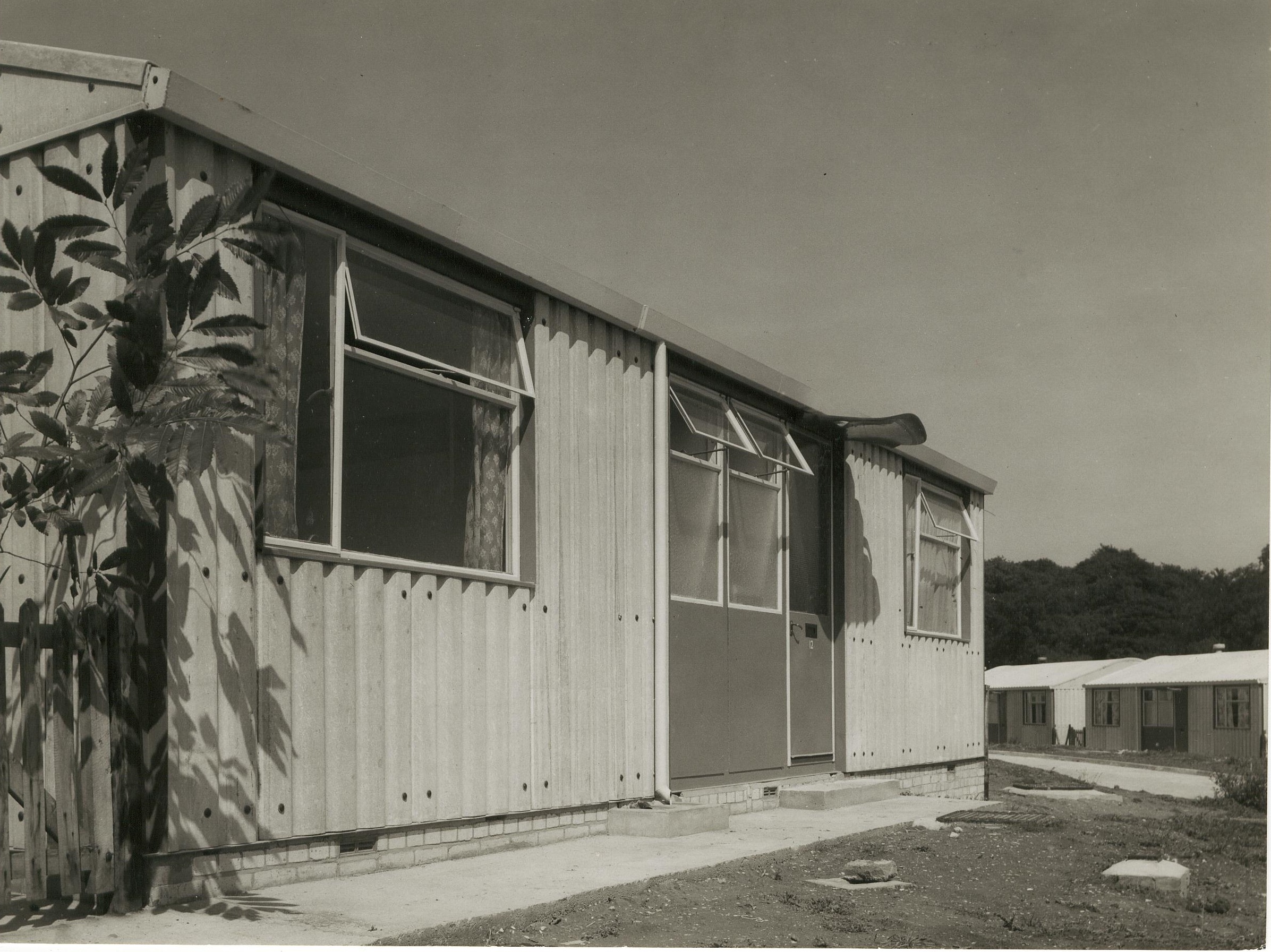 Close up of Arcon MkV prefab with two further prefabs in background