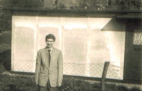 Brother Len in garden of 74 Narford Road. Next door's prefab can be seen