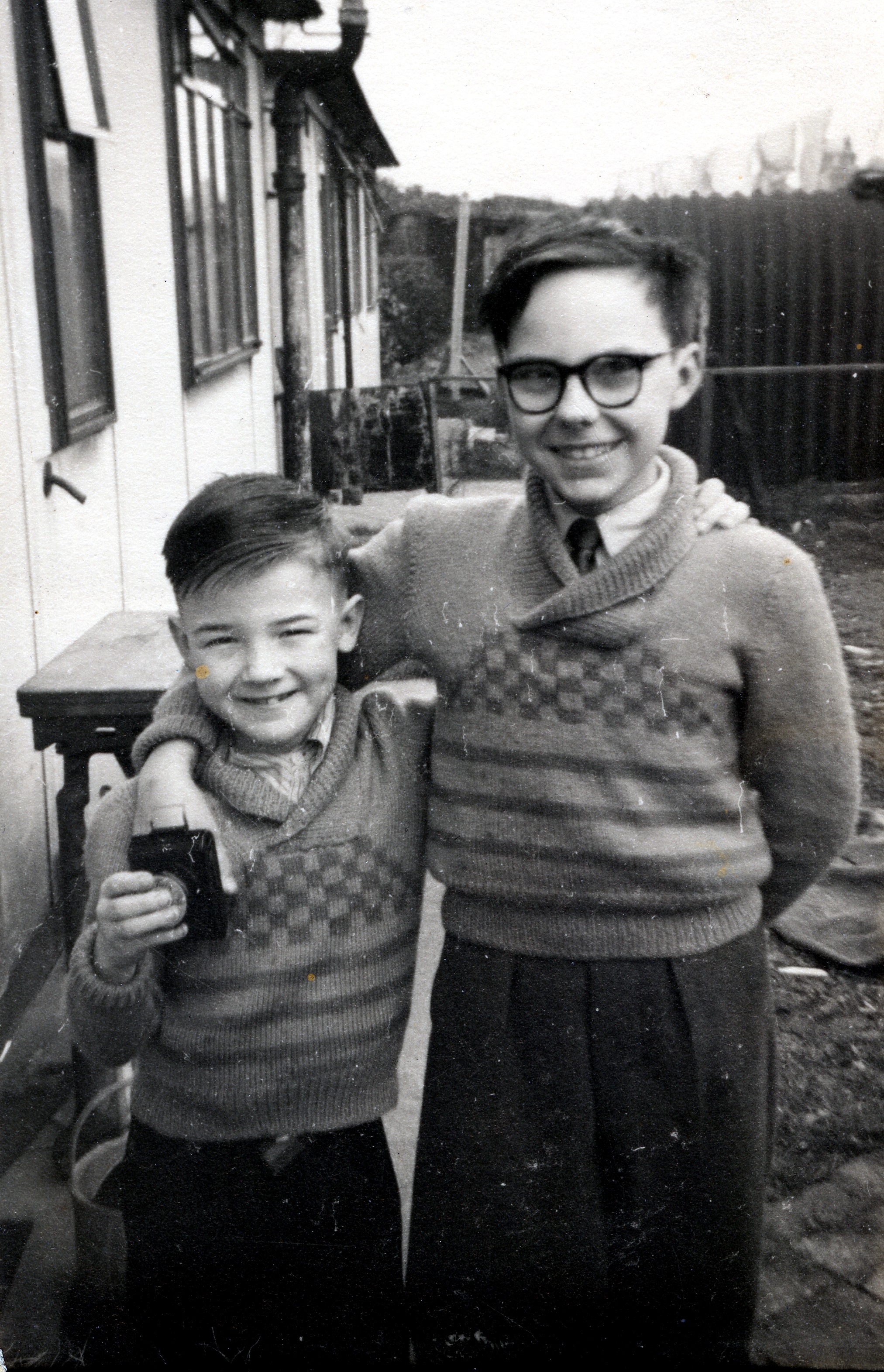 John and his brother outside the prefab in Underhill Road, London SE22