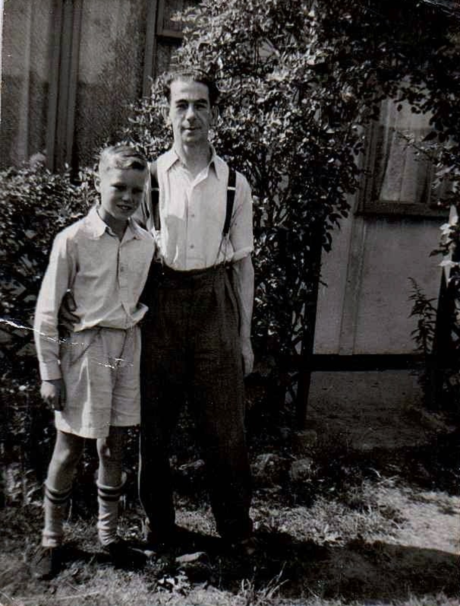 Ben with his dad in their prefab garden, Dartmouth Park Hill, London N19