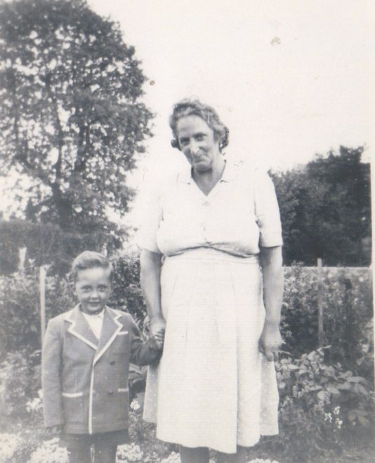 Terence and his grandmother in the prefab garden, Dartmouth Park Hill, London N19