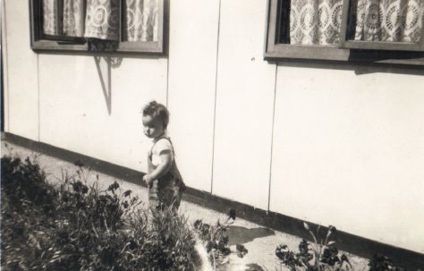 Terence's cousin Denise outside his prefab, Dartmouth Park Hill, London NW5