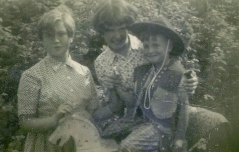 Peter on his fourth birthday with his sisters. Abbots Gardens