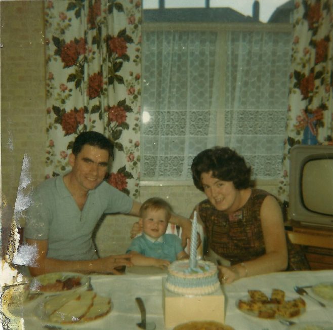 George and Pat Maslin with Paul on his first birthday. Berthon Street, Deptford, London SE8