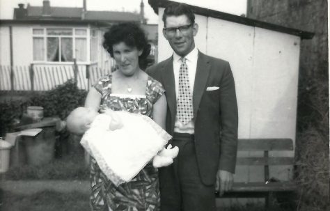 Kit and Charlie Phelps (Paul's paternal grandmother and her second husband) holding their first grandchild (Gary Maslin - Paul's cousin). Berthon Street, Deptford, London SE8