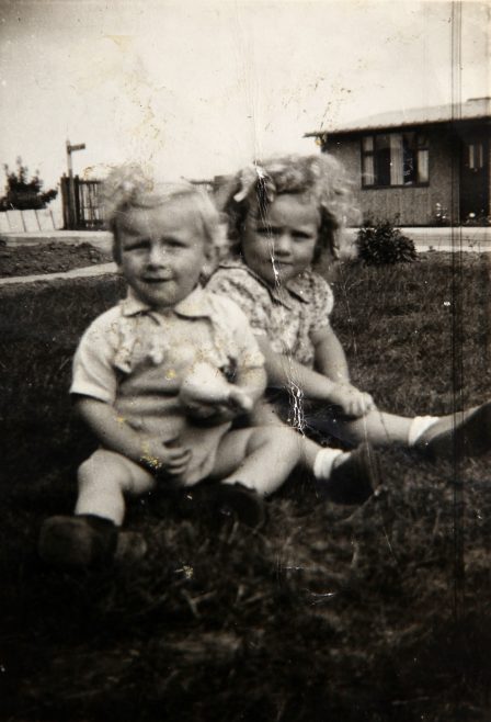 Two small children in the prefab garden. Bolsover, Derbyshire