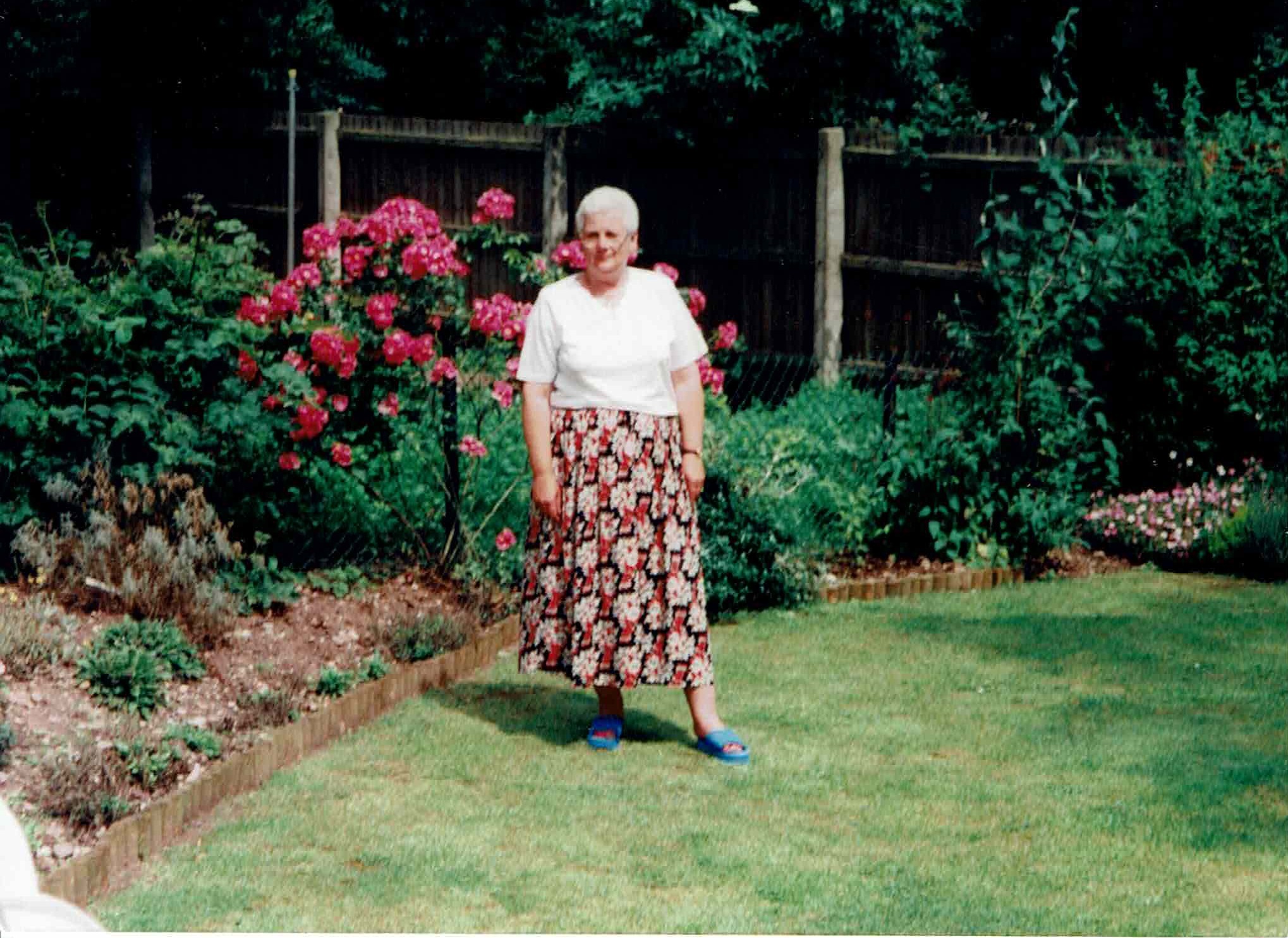 Debra Baker in her prefab garden, 413 Wake Green Road, Moseley