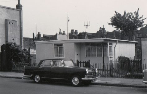 Dad's new Morris Oxford parked outside our prefab at no. 4 Tooke St. London, E14