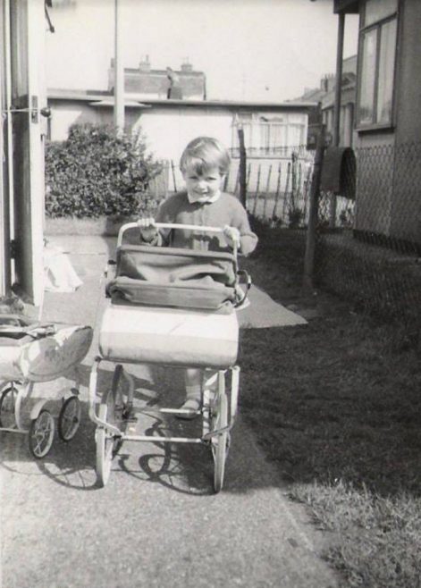 With her pram outside the prefab, Homerton, London E9