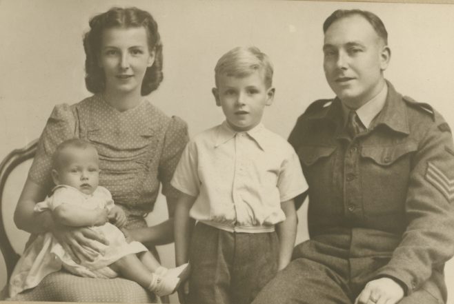 Portrait of Eddie O'Mahony, his wife and two children