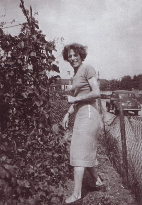 Jim's mum in the prefab garden. Excalibur Estate, London SE6