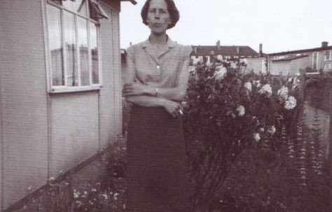 Jim's mum outside the prefab. Excalibur Estate, London SE6