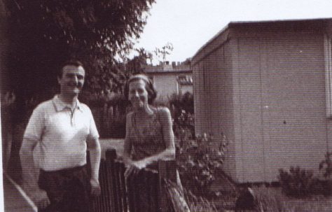 Jim's mum at the prefab gate. Excalibur Estate, London SE6