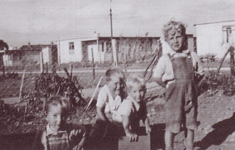 George and four kids. Excalibur Estate, London SE6