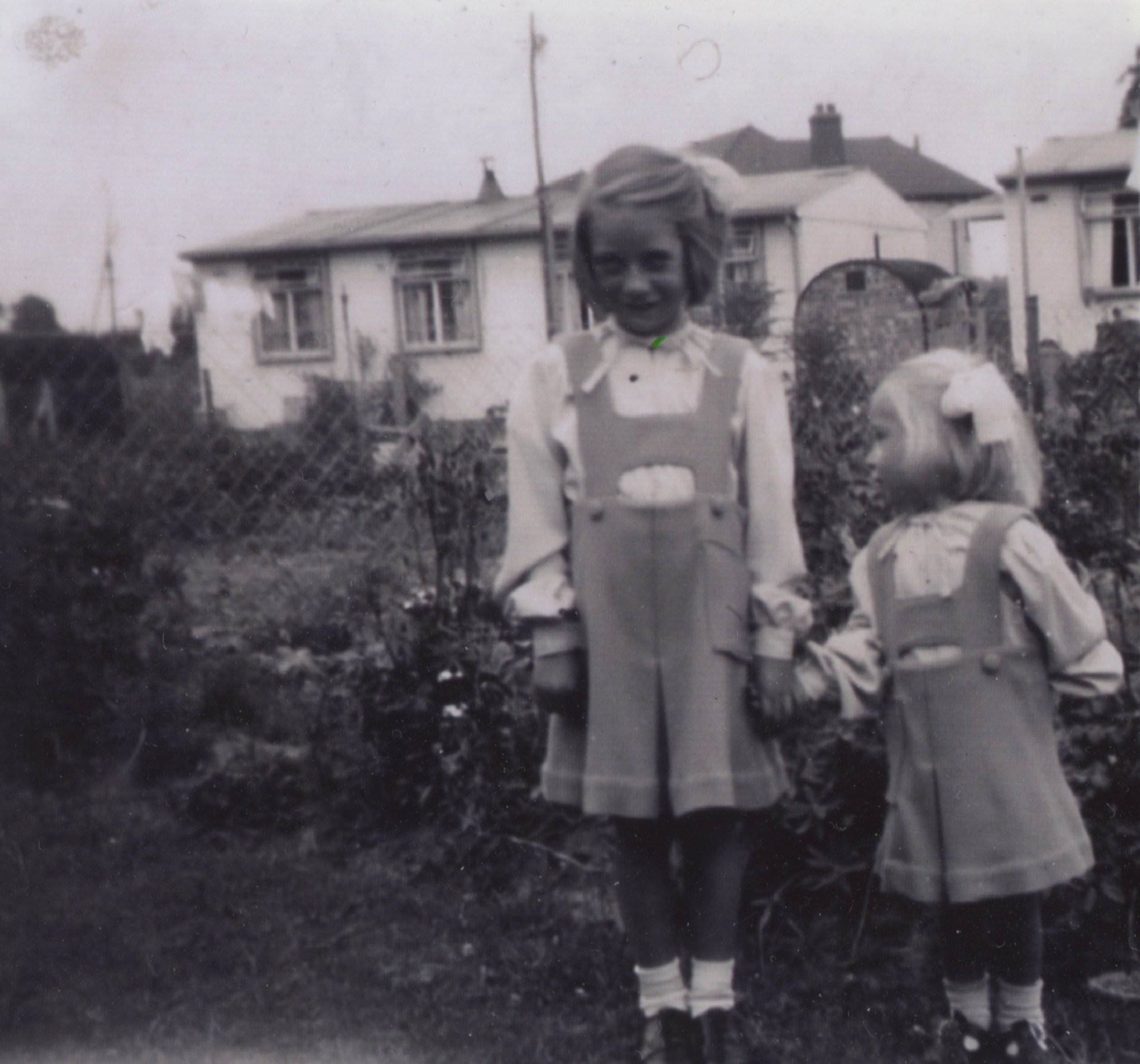 Elizabeth and Pauline in the back garden with nos 1 and 2 in the background. 6 Willow Lane, Wickford, Essex