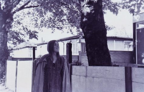 Jo outside the prefabs on St Helens Gardens, London NW10