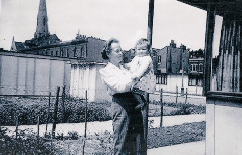 Mrs Rennie with baby. St Lawrence Road, Brixton