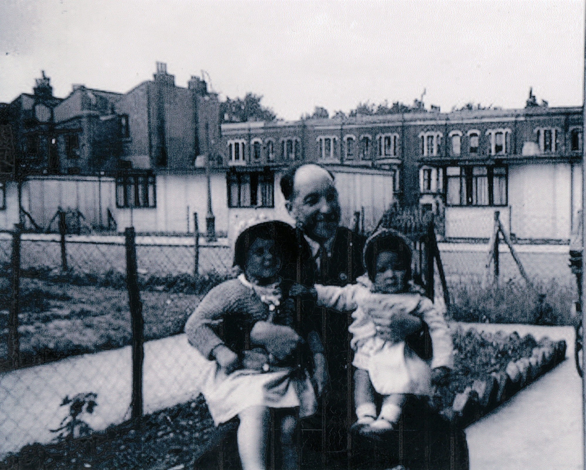 George Rennie with his two daughters Judy and Naomi. St Lawrence Road, Brixton