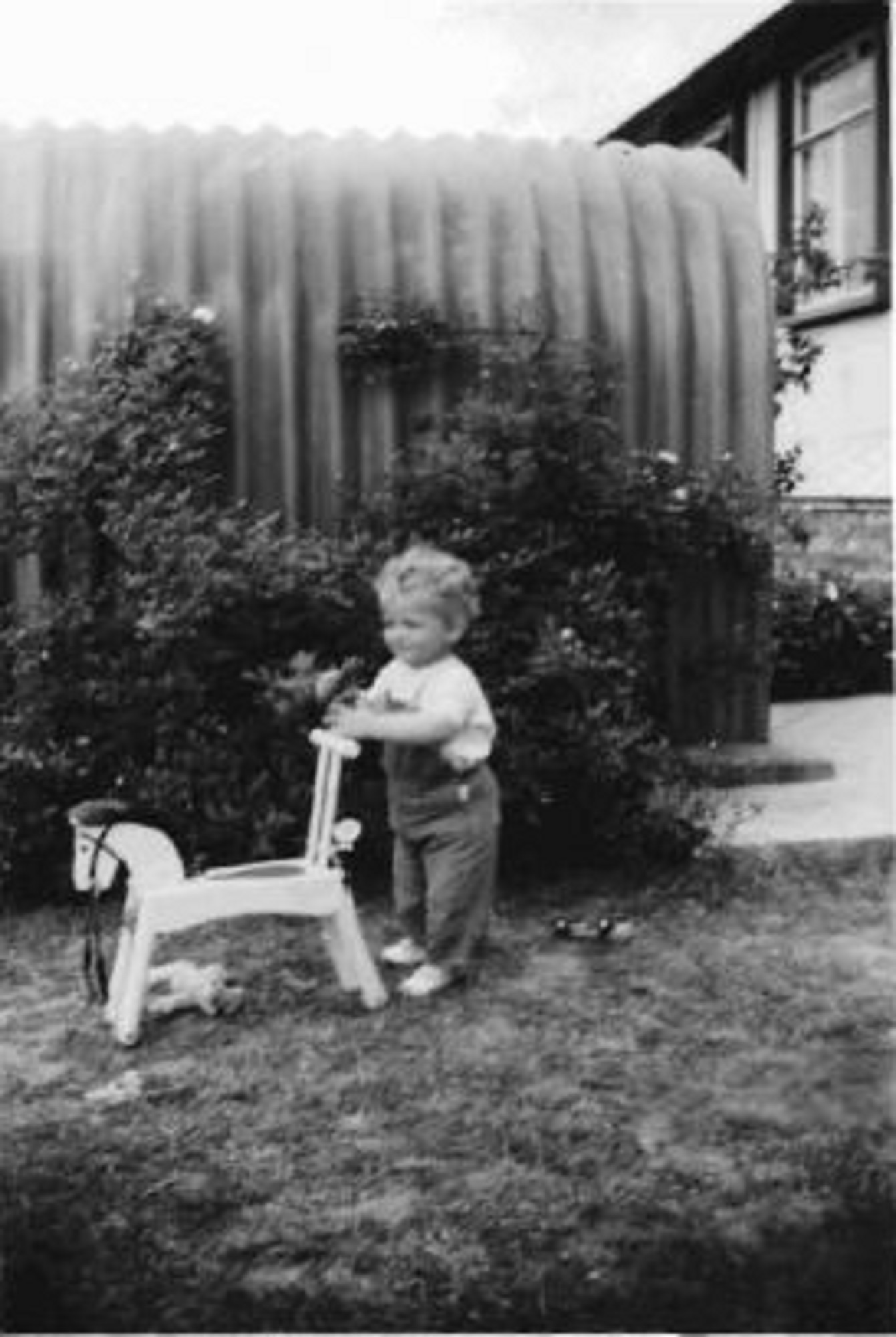 Pushing a toy horse, Barnfield Road, St Mary Cray