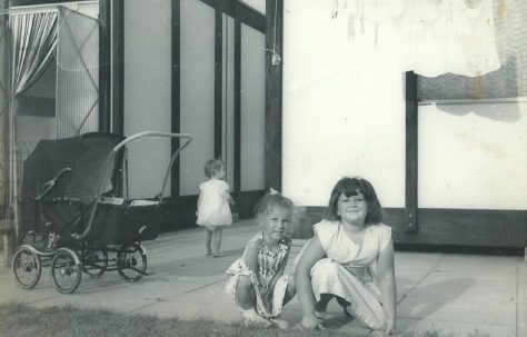 Dave's sisters outside the LCC Mobile Home. Essian Street, Stepney