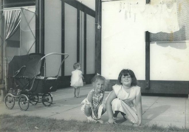 Dave's sisters outside the LCC Mobile Home. Essian Street, Stepney