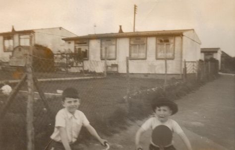 Roger and his friend in the prefab alley, south London