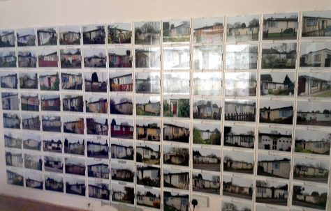 Wall of photos of prefabs on the Excalibur Estate, Prefab Museum. 15 April 2014.