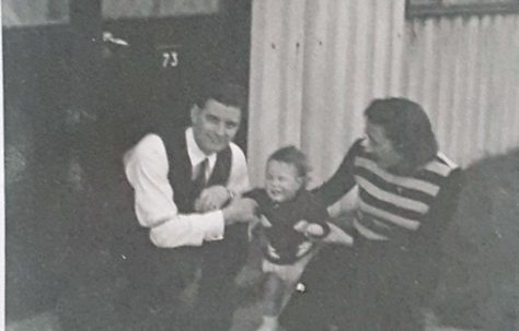 Auntie & Uncle with my brother outside the prefab at Avelon Road. Romford.