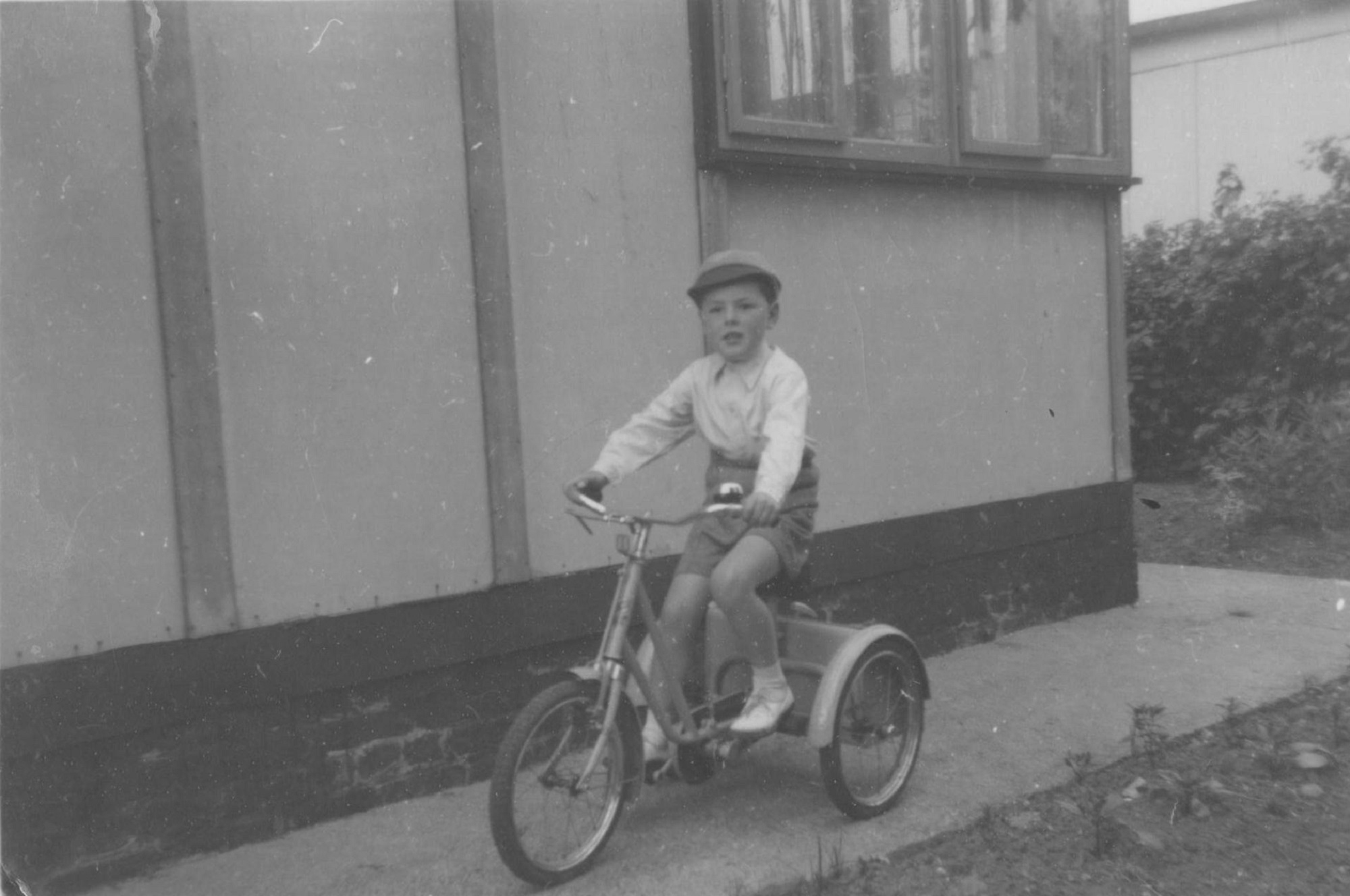 Robert on his bike outside the prefab. Kendal Road, London NW10